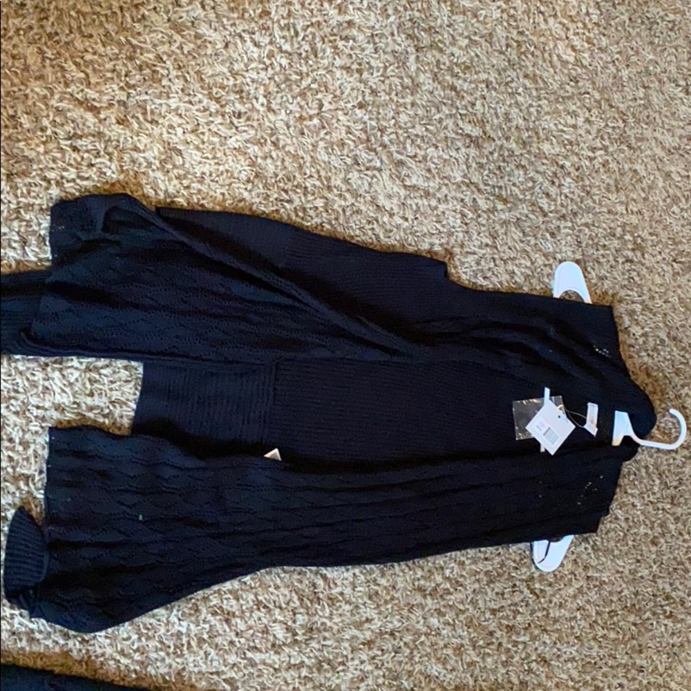 Black womans sweater. Vest